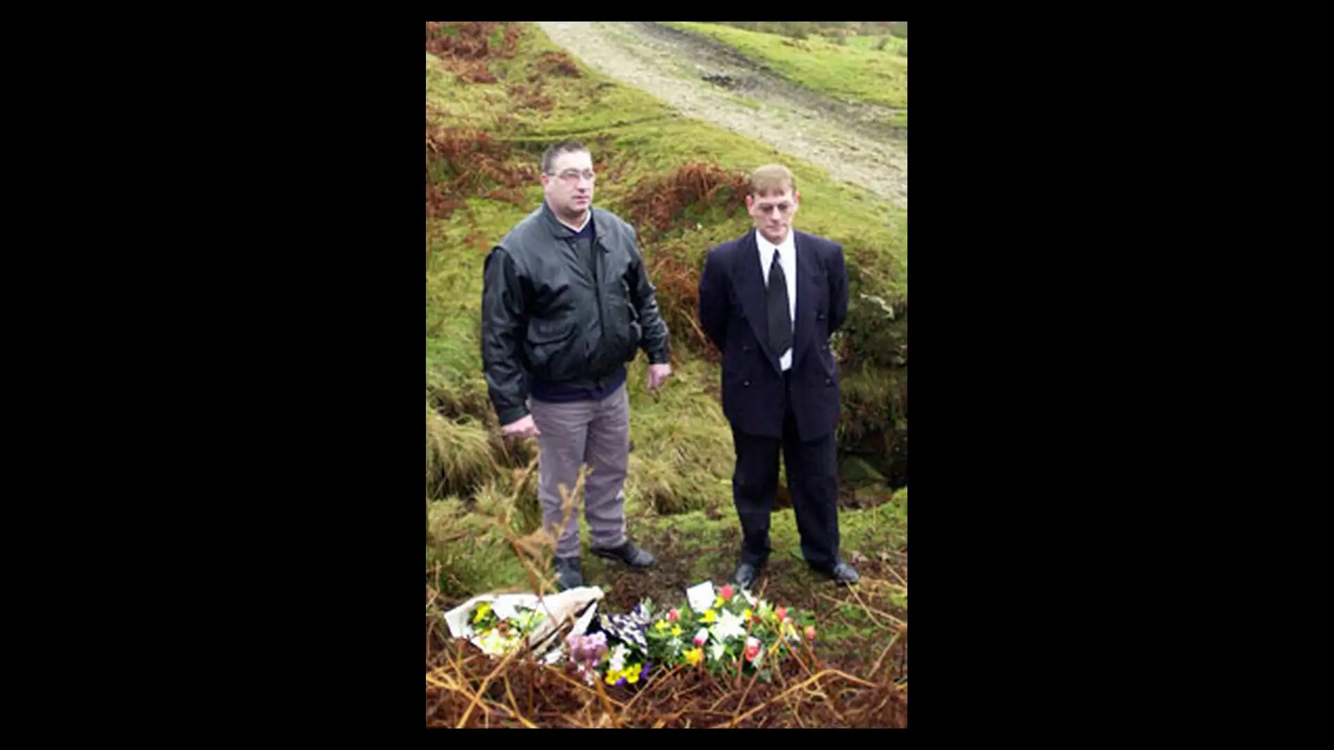Vicky Glass’ stepfather Colin and father Anthony beside the spot where she was found